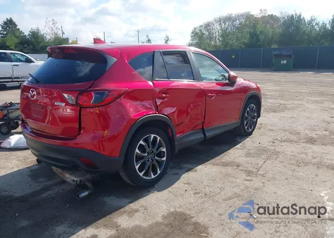2016 Mazda Cx-5 Grand Touring z USA, uszkodzony, nr VIN JM3KE4DY4G0781687